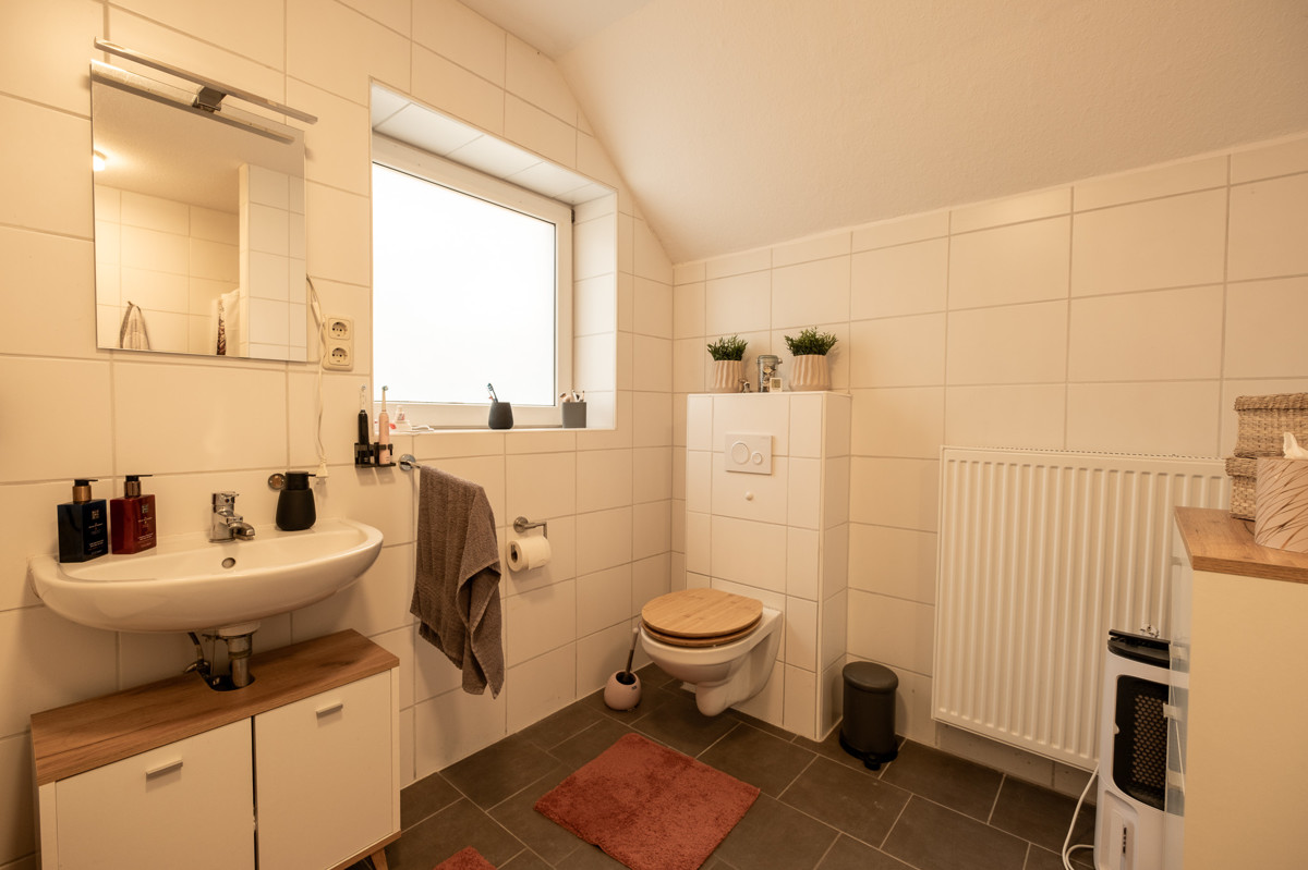 Duschbad Haus vorne
